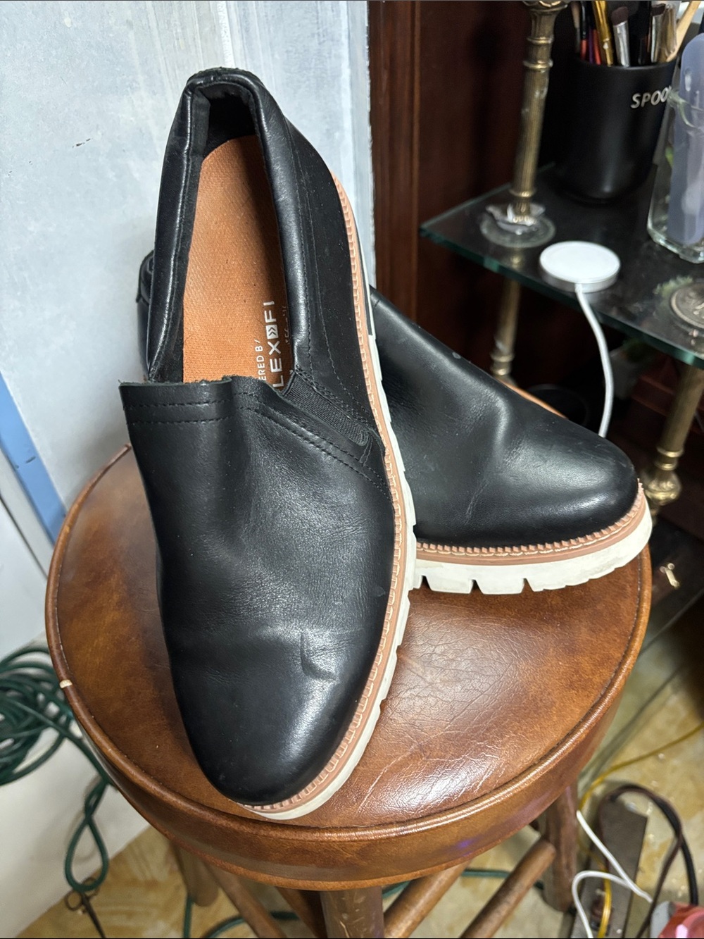 Caterpillar Black Slip-On Leather Flats with White Soles